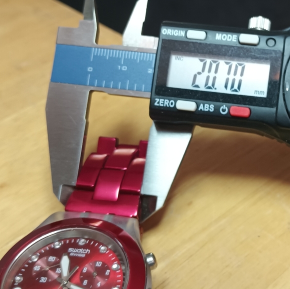 X Swatch Irony Diaphane Ruby red bezel and dial 3 hand movement date 43mm - Picture 5 of 9